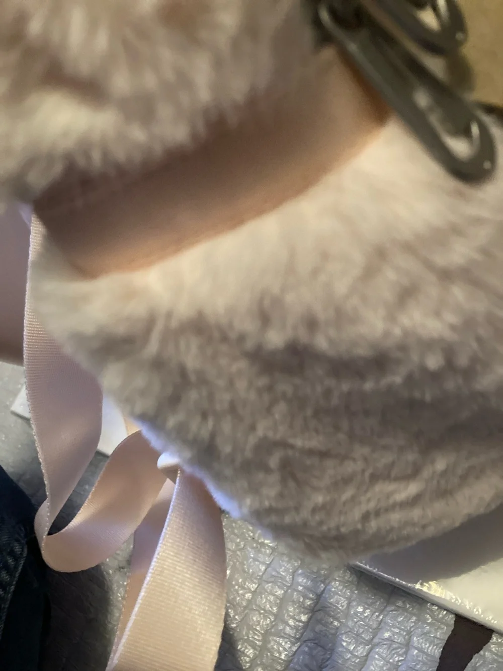 Nike Plush Faux Fur Backpack in Light Pink with Black Swoosh